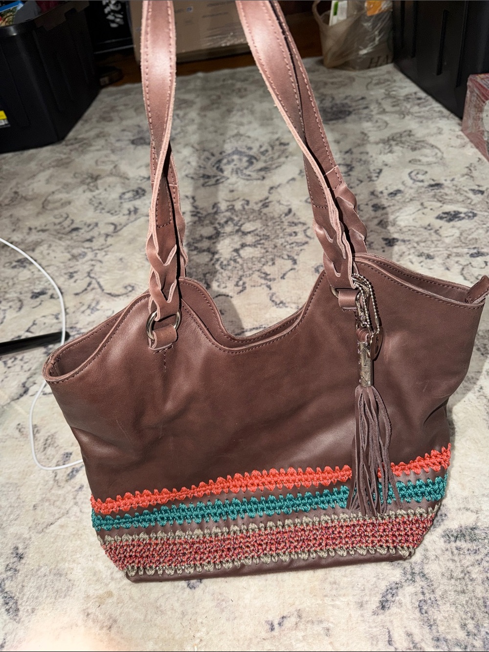 The Sak Brown Shoulder Bag with Crochet Stripe Accent and Tassel EUC